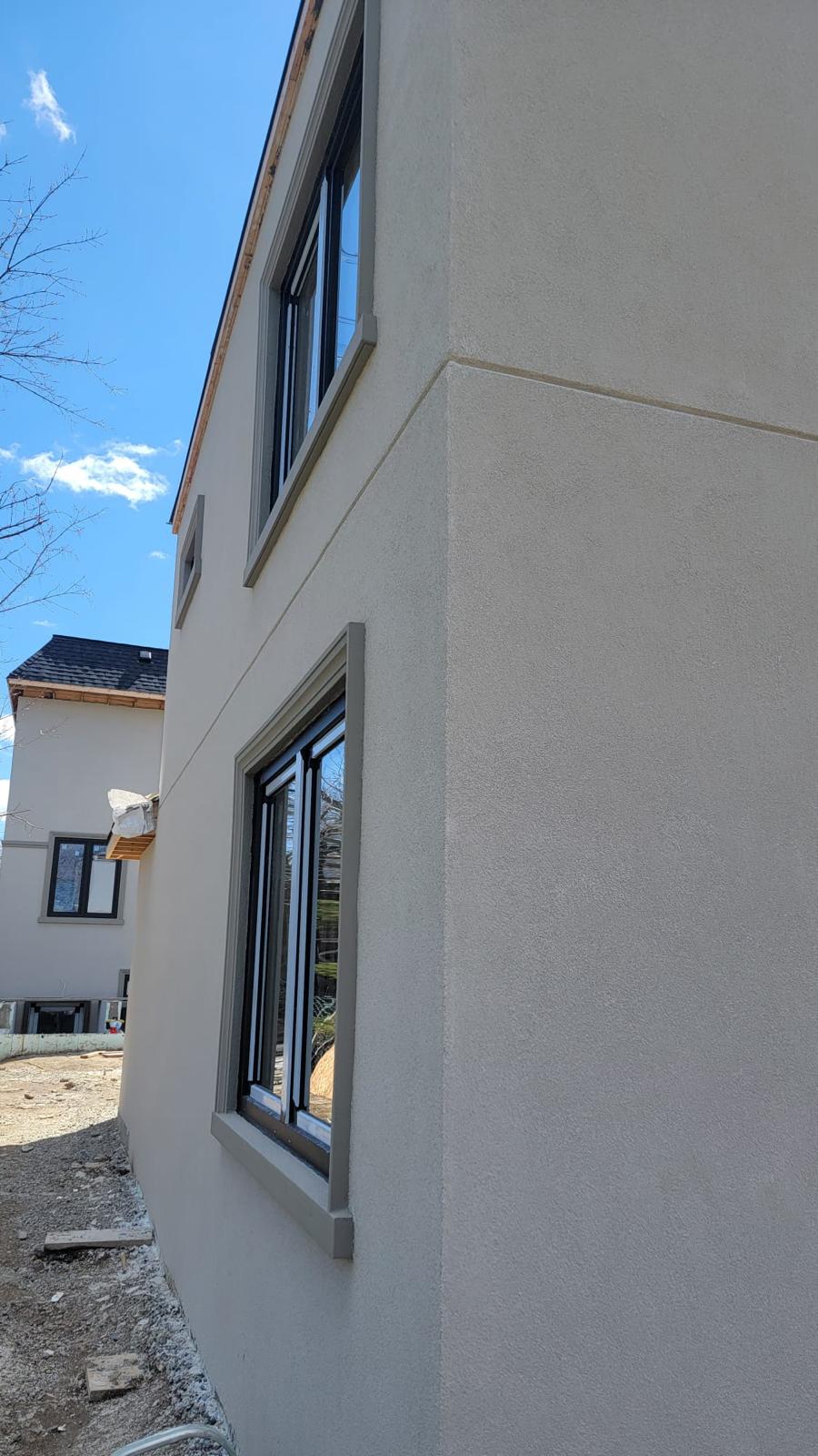 Contemporary smooth stucco corner elevation