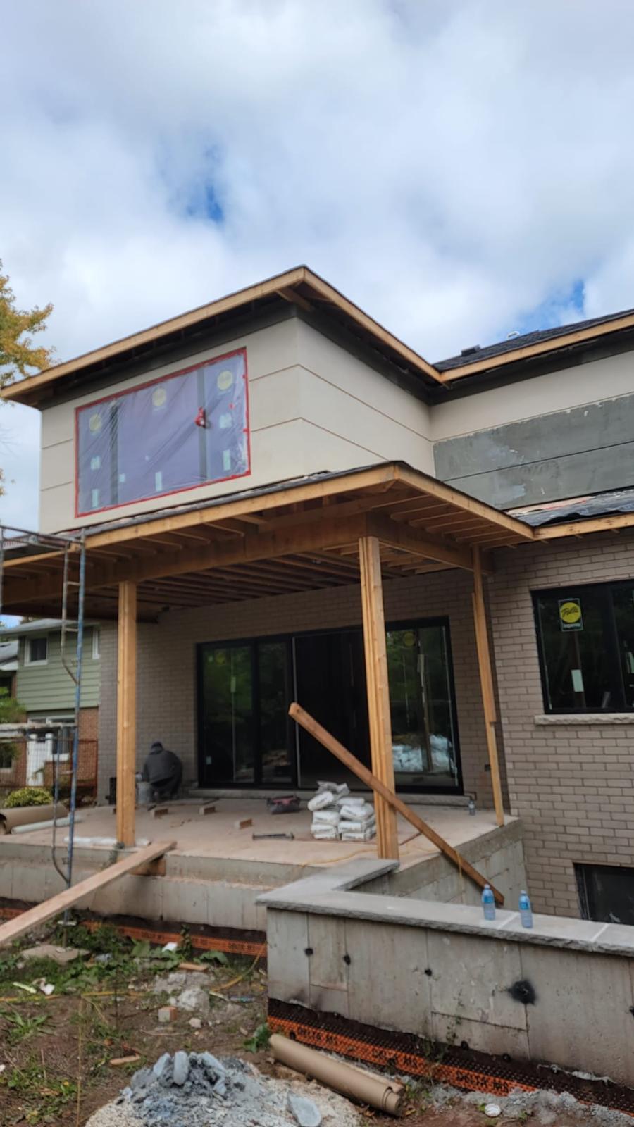 Covered patio addition with wood beam posts