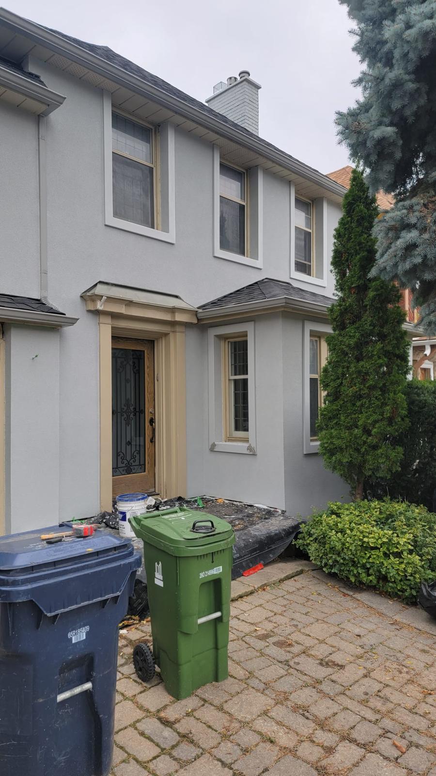 Grey stucco townhome front entry refresh