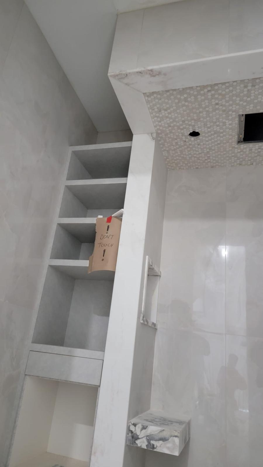 Built-in marble shelving detail